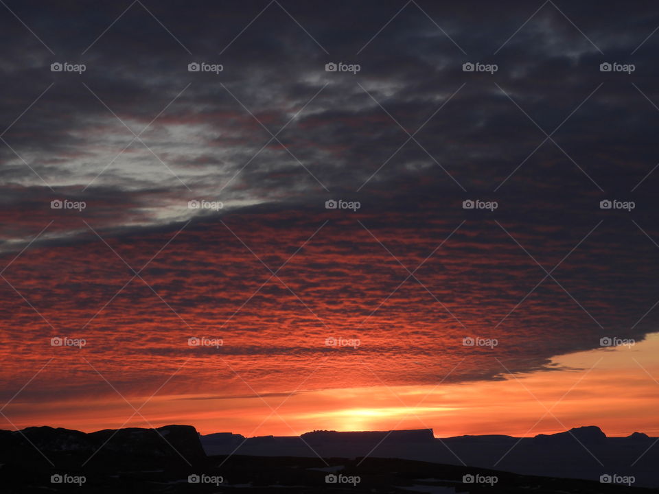 This picture was taken at Larsemann hills, Antarctica on 09-05-2017. This picture shows the creative texture of clouds during sunset at no mans land . 