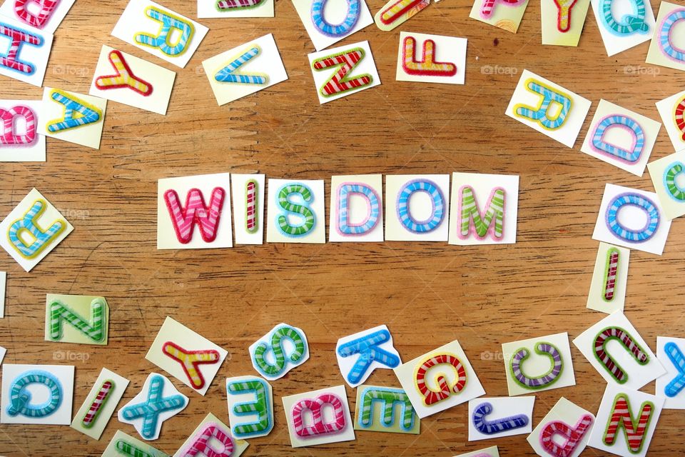 word wisdom in colorful letter. word wisdom spelled in colorful letters
