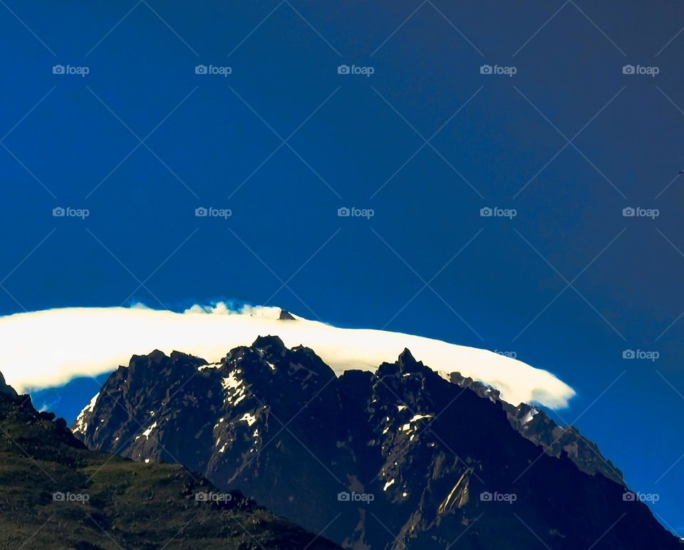 Mountain peaks with clouds