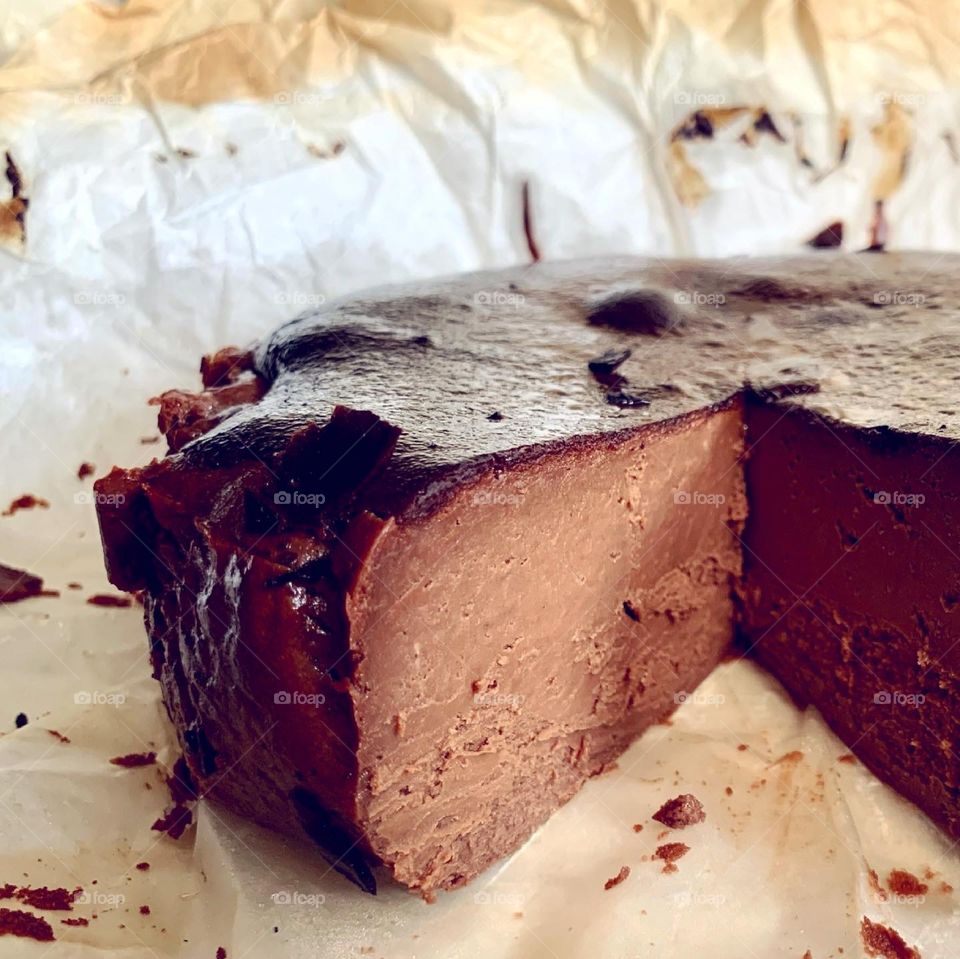 Dark chocolate basque burnt cheesecake sliced up 