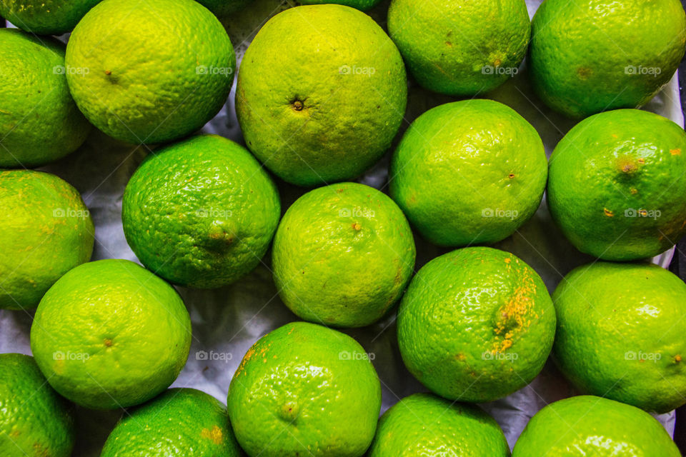 Fresh green lemons