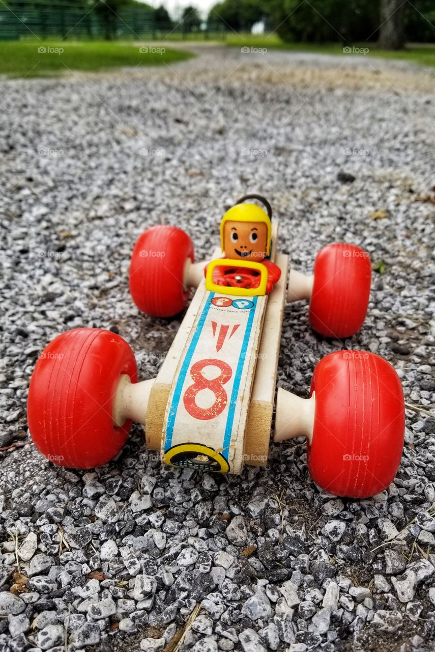 A Vintage 1960's Fisher Price Bouncy Racer