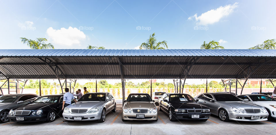 Car parking lot with rain cover