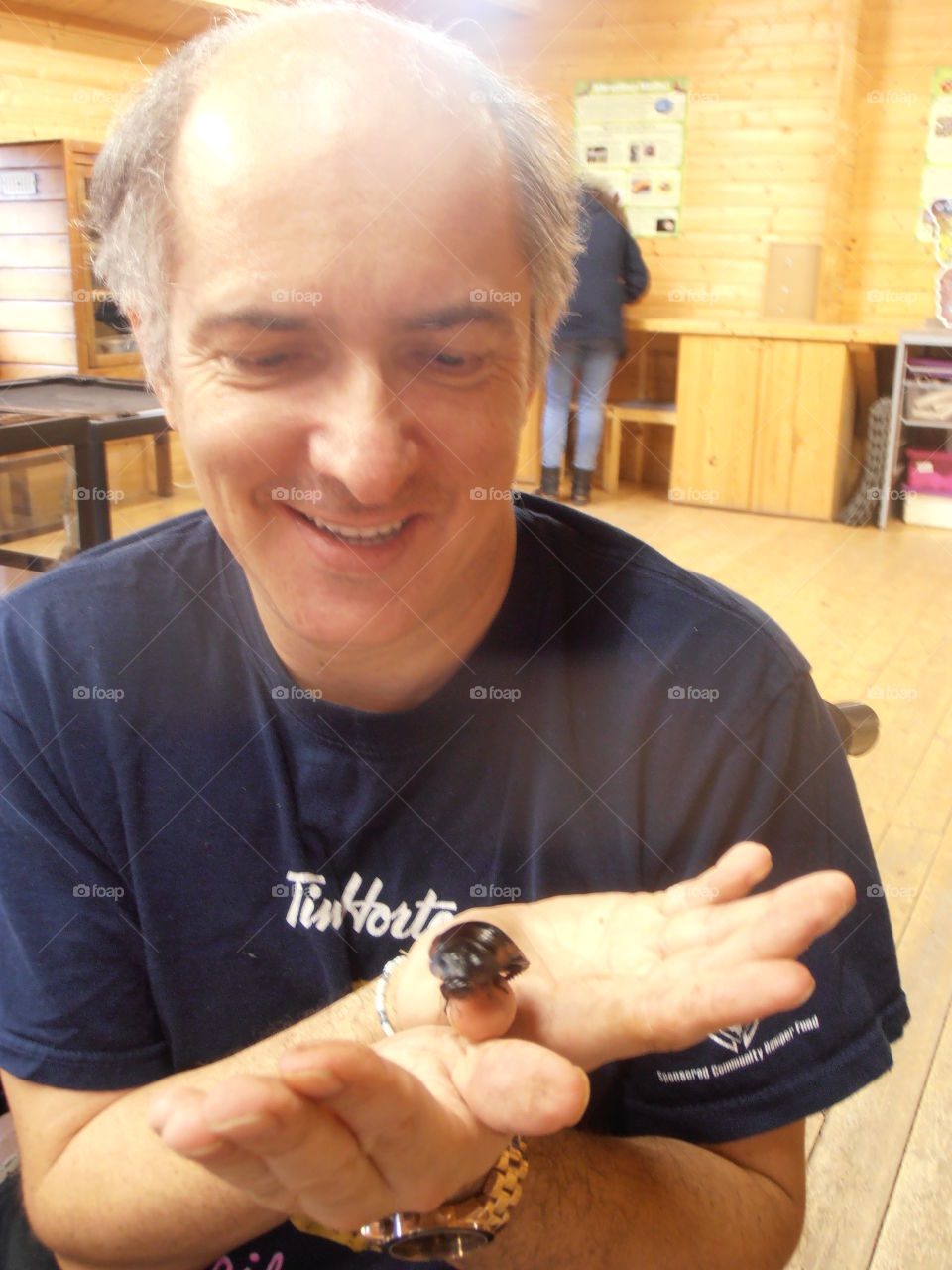 Holding A Hissing Cockroach