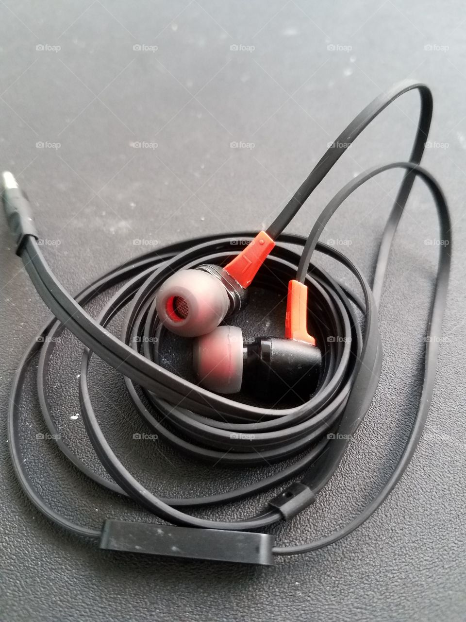 black and red ear buds