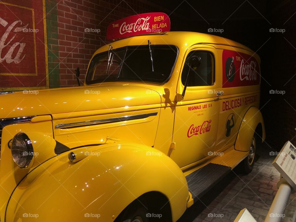 Old school yellow coke delivery car