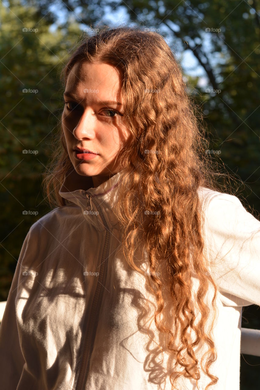 girl beautiful portrait close up in the sunlight