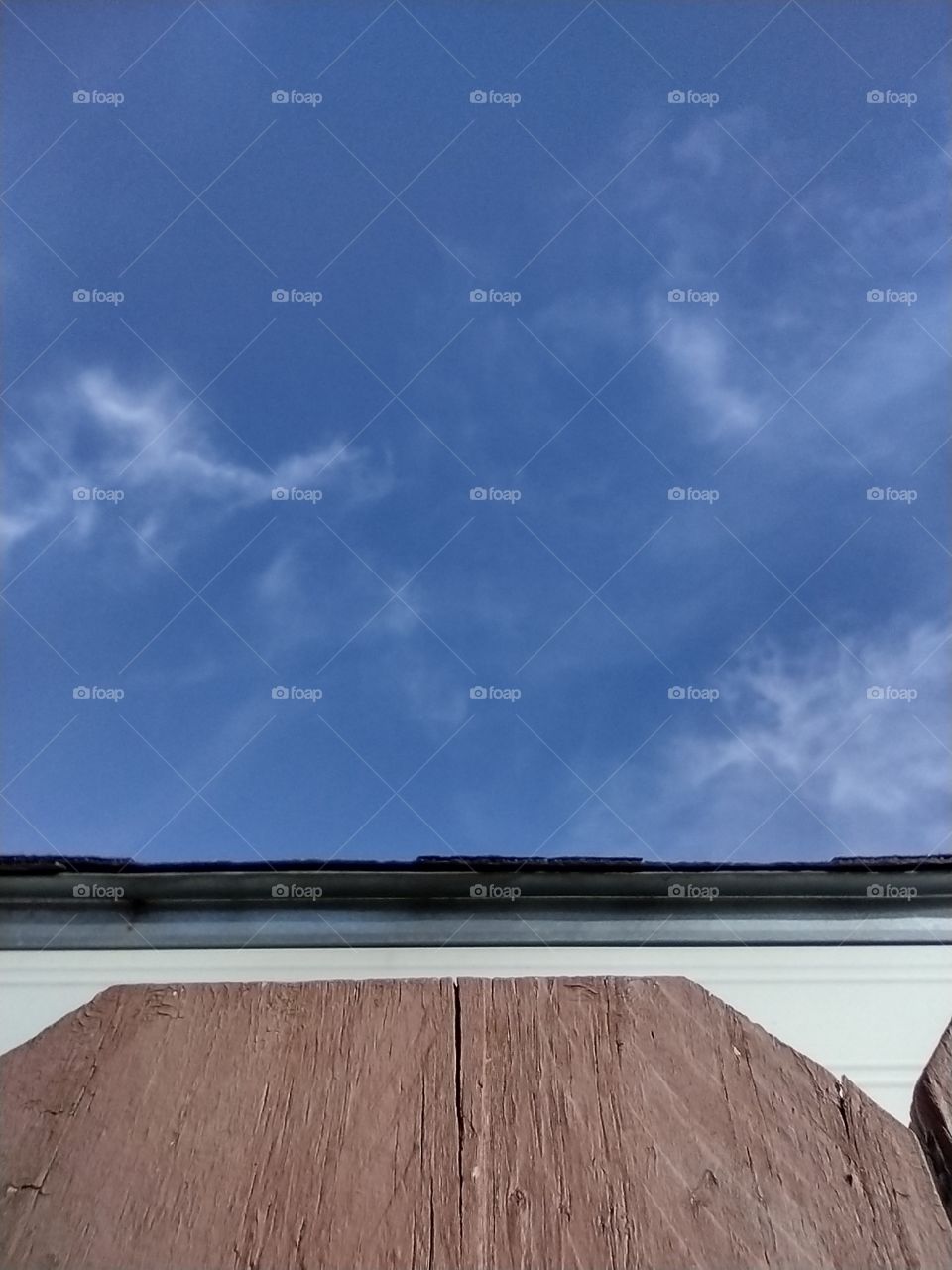 Unfiltered beautiful fence and sky