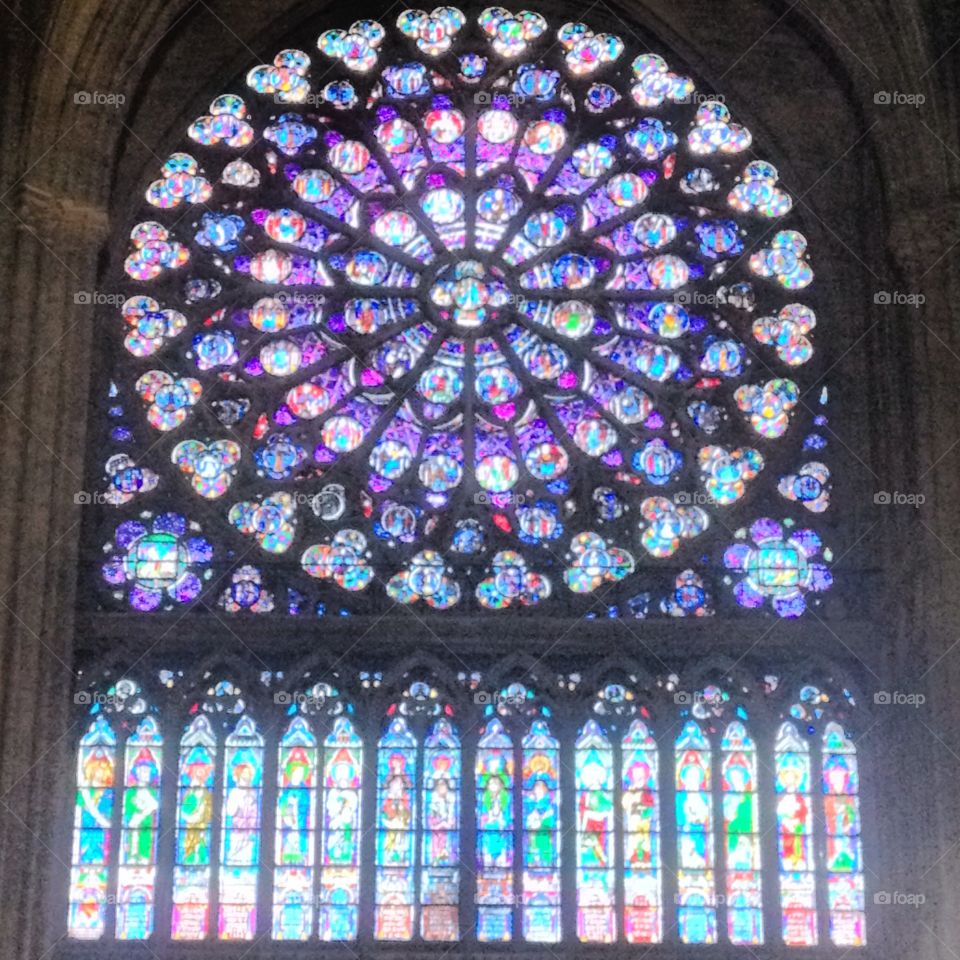 Stain glass in Notre Dame. Beautiful stained glass window in the Notre Dame cathedral in Paris 