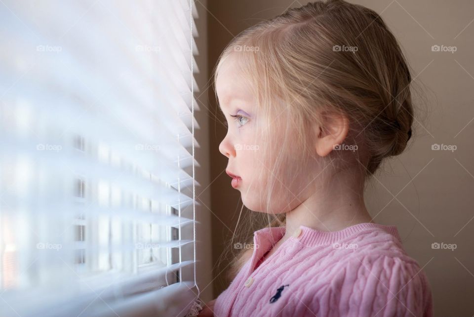 Girl Looking out window