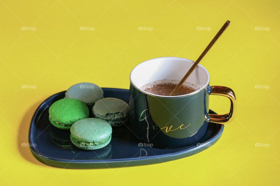 Cup of coffee and macaroons