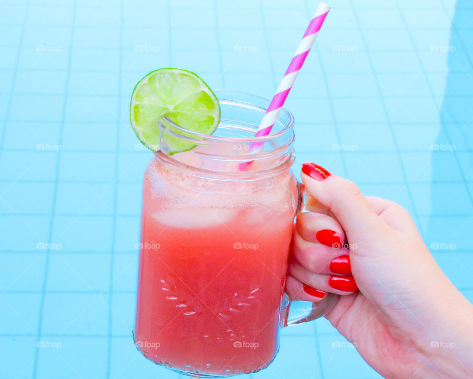 pool party with a pink lemonade