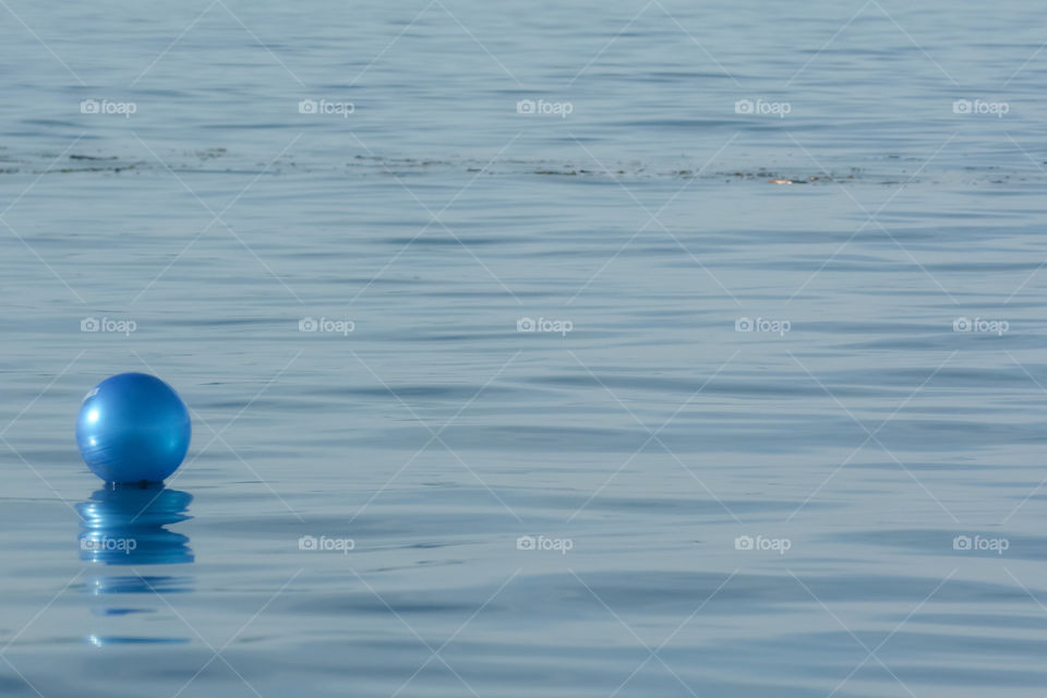 Ball floating in the ocean
