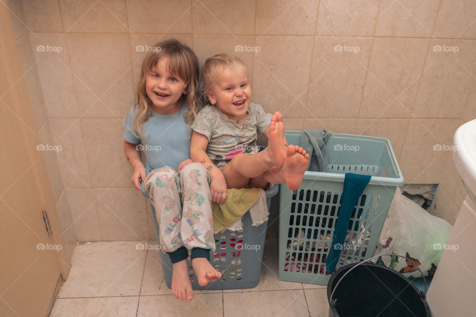 Naughty kids in the bathroom