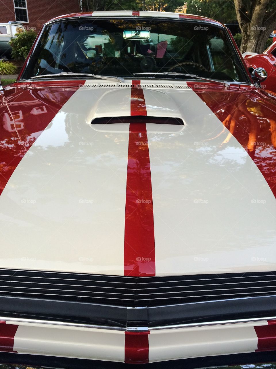 Striped to race. Classic sports car waxed and ready to race

