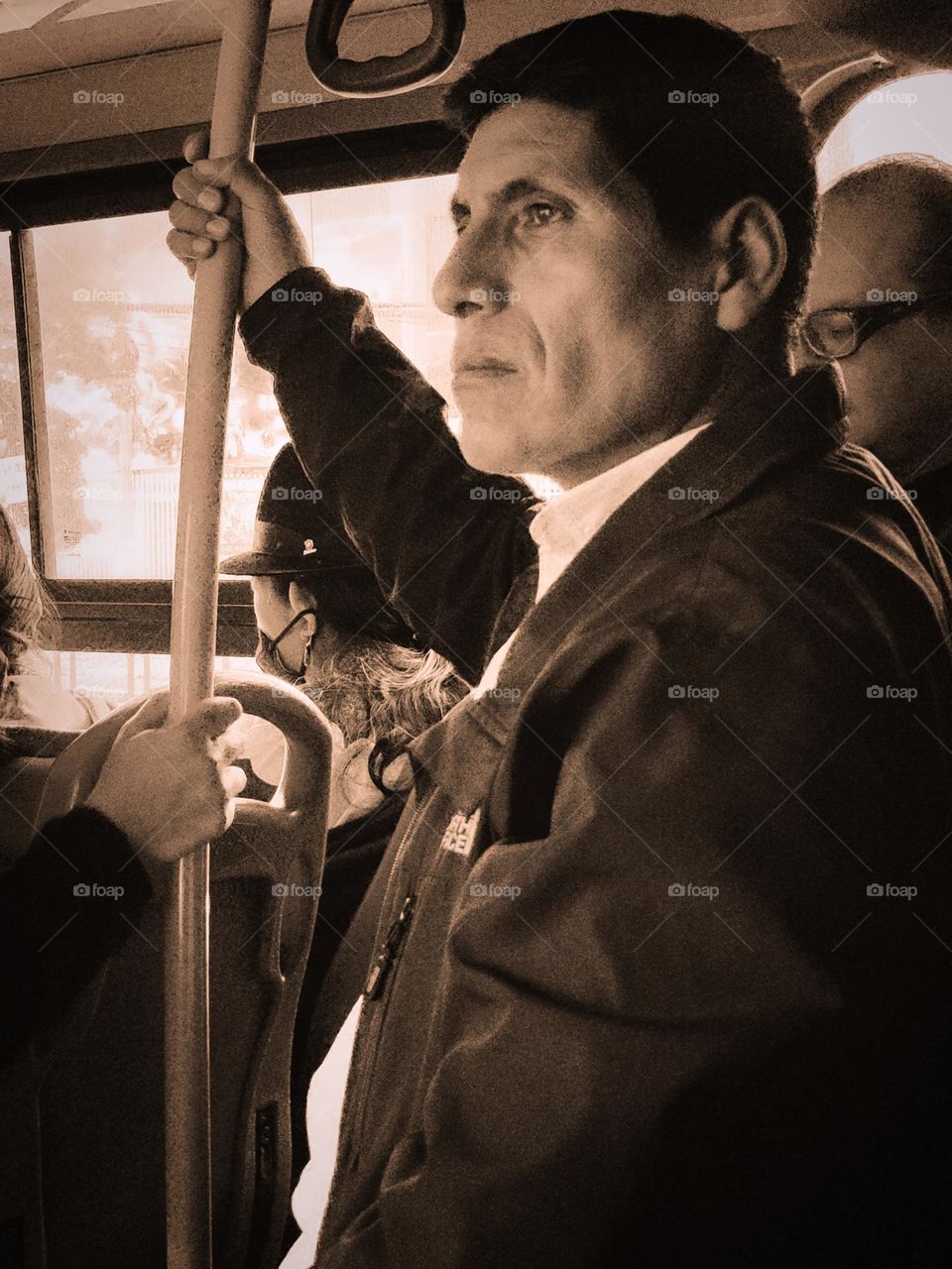 Melancholic man on bus