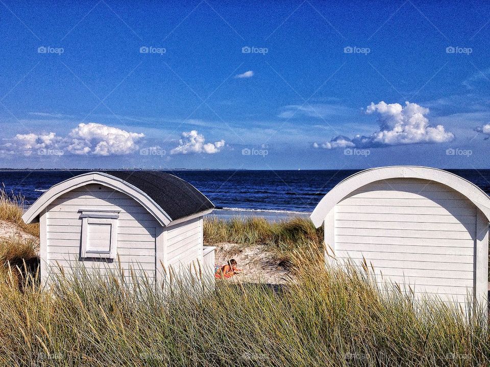 Beach huts in sand dunes