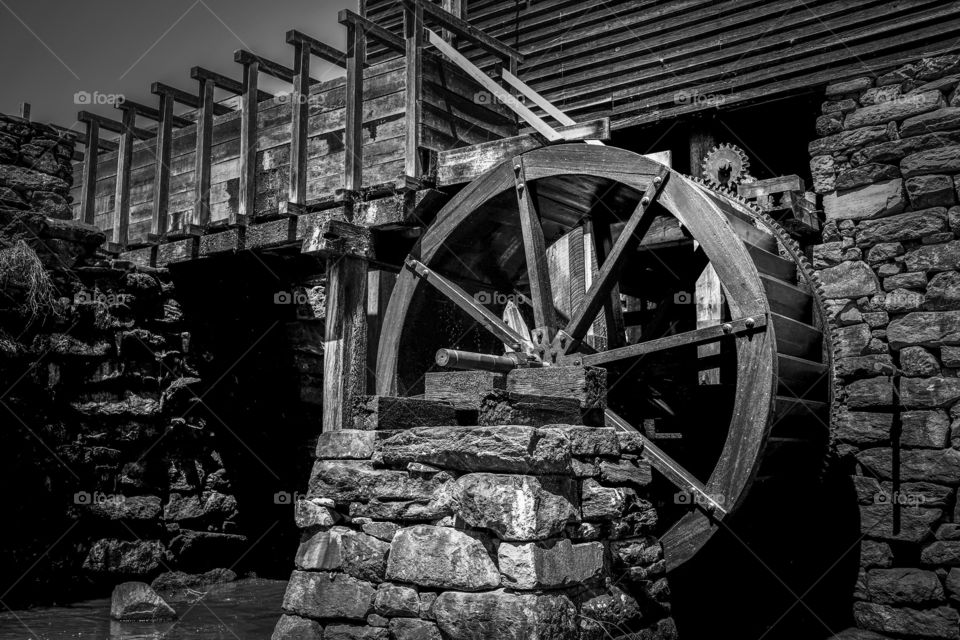 Foap, Color vs Black and White: The flume and waterwheel of the old gristmill at Historic Yates Mill County Park in Raleigh North Carolina.