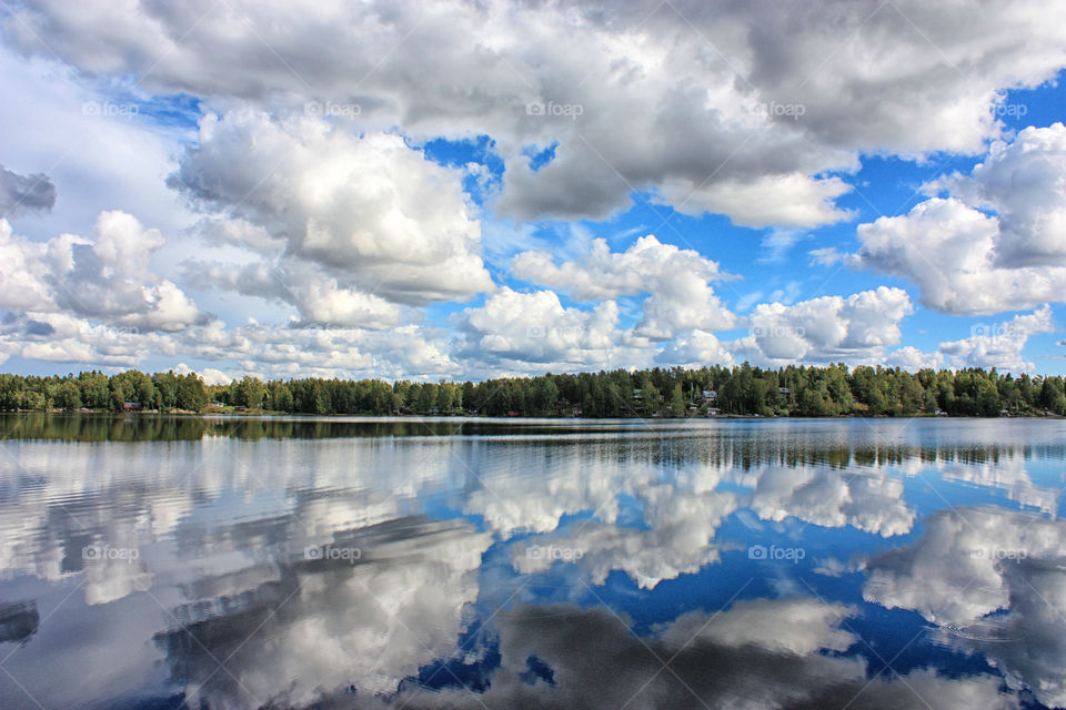 Beautiful sky and clouds reflection on lake