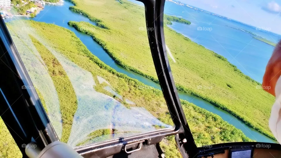 outdoor service equipment sunrise day trip sunlight sunset ocean sun wealth plane sea nature journey evacuation accident rich airplane sunny lifestyle adventure safety landscape tourist helipad vacation airport landing helicopter transportation trans