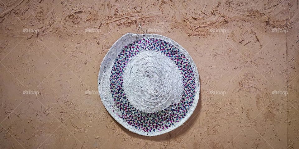 Straw beach hat and uses with décor