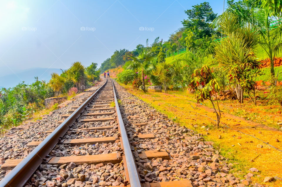 Photograph Mountain Railways Track Vizag India snap in landscape style. Subject is adventure inspiration exciting calm beautiful. Useful for background screen saver. Travel Transportation Concept
