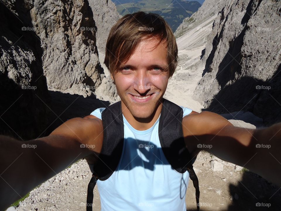 Happy man in high mountain. Sasso lungo,Dolomiti,Italy