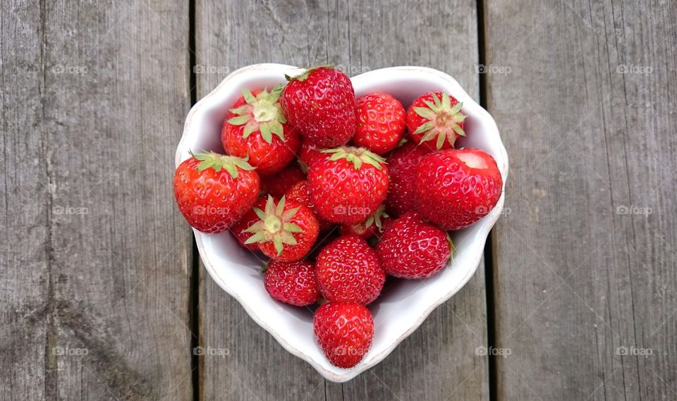 Strawberries in a heart shaped bowl
