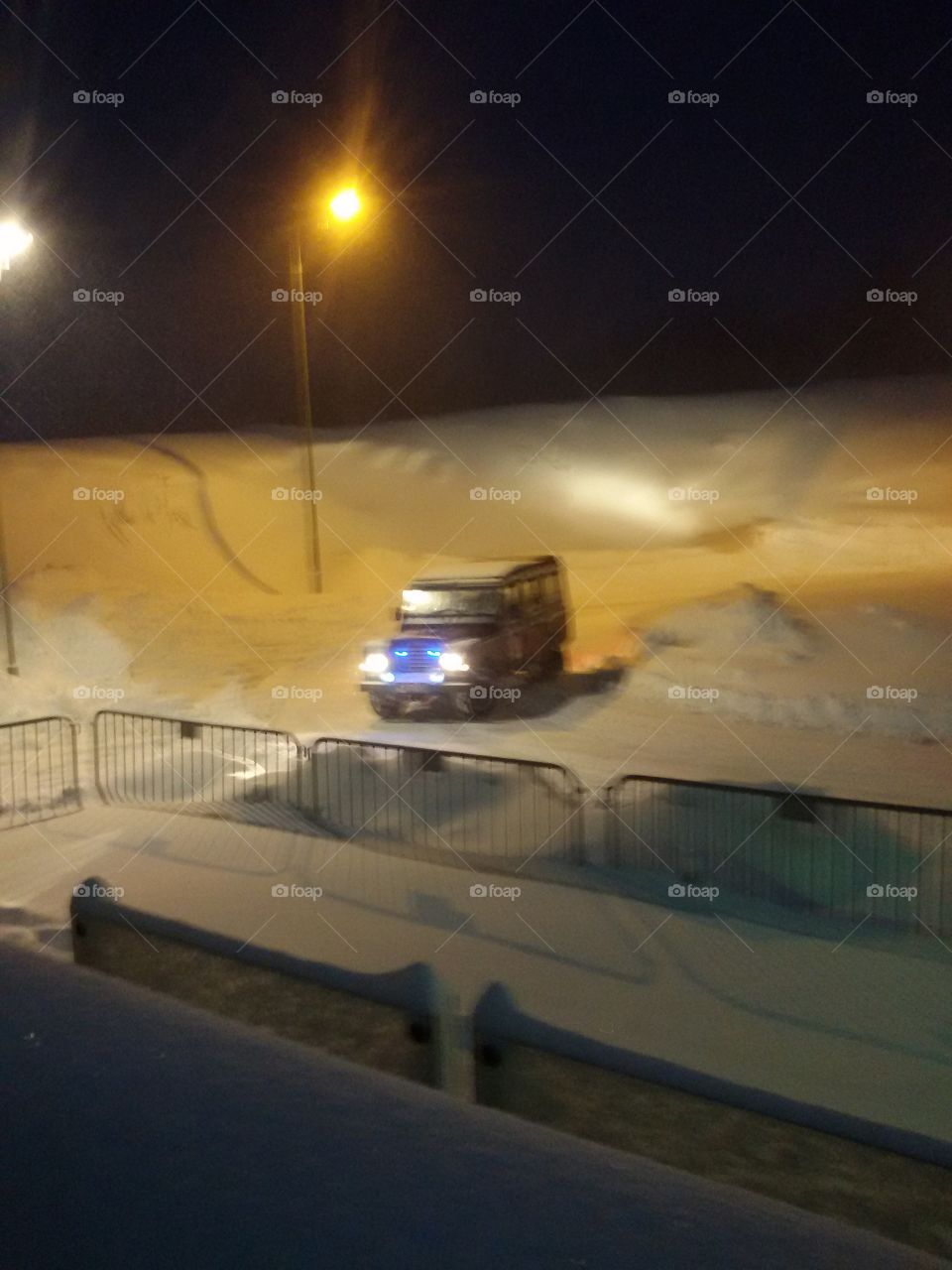 police car on snow road