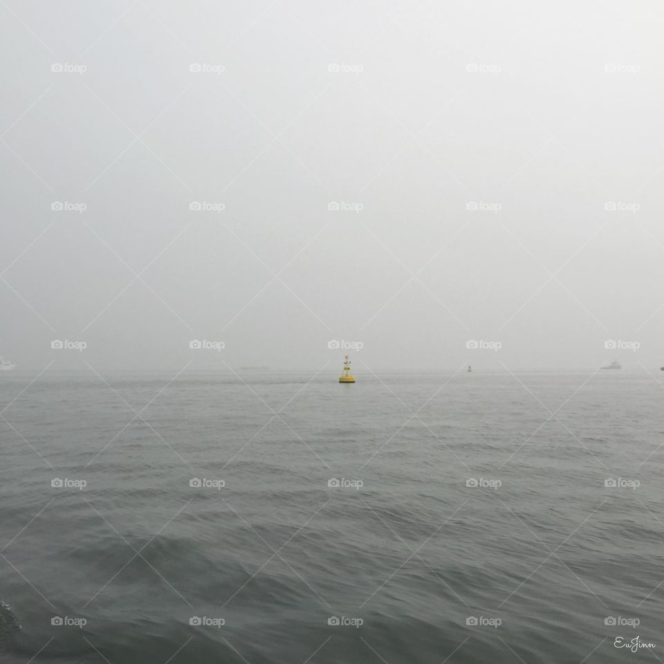 Buoy in the haze