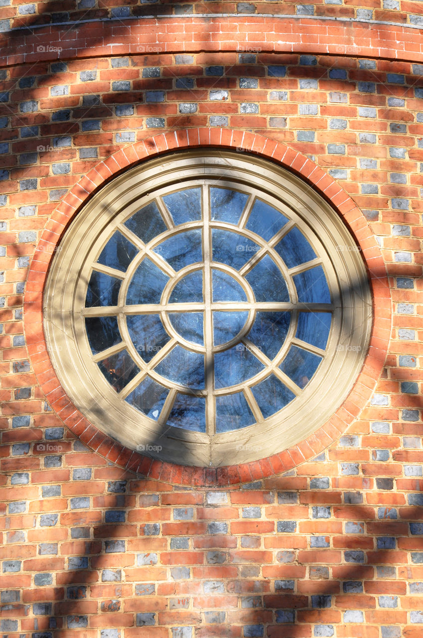 A lovely round window on the capitol building in Historic Williamsburg Virginia.