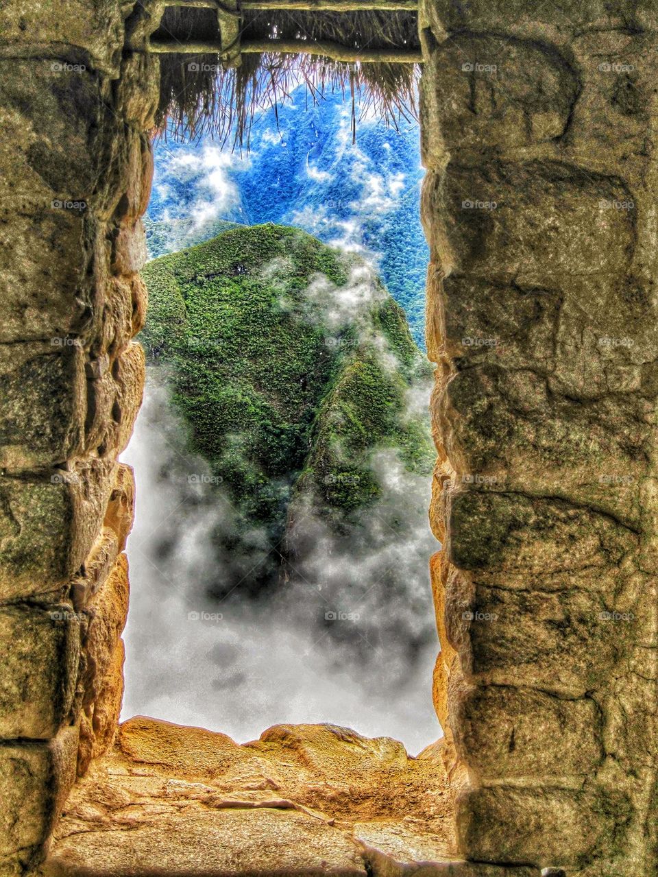 Lush mountains seen through doorway