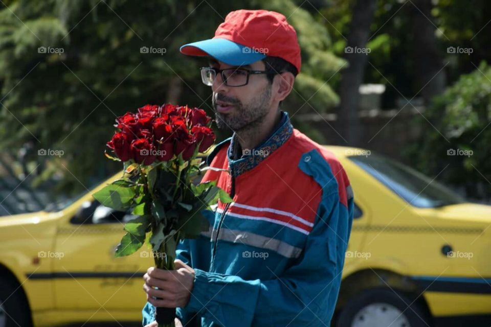 By enjoying his moustache and stubble,He is the one who feel vitality next to the lovely red roses
Having mustache and beard creates a sense of distinctiveness and individuality and makes some men really attractive .