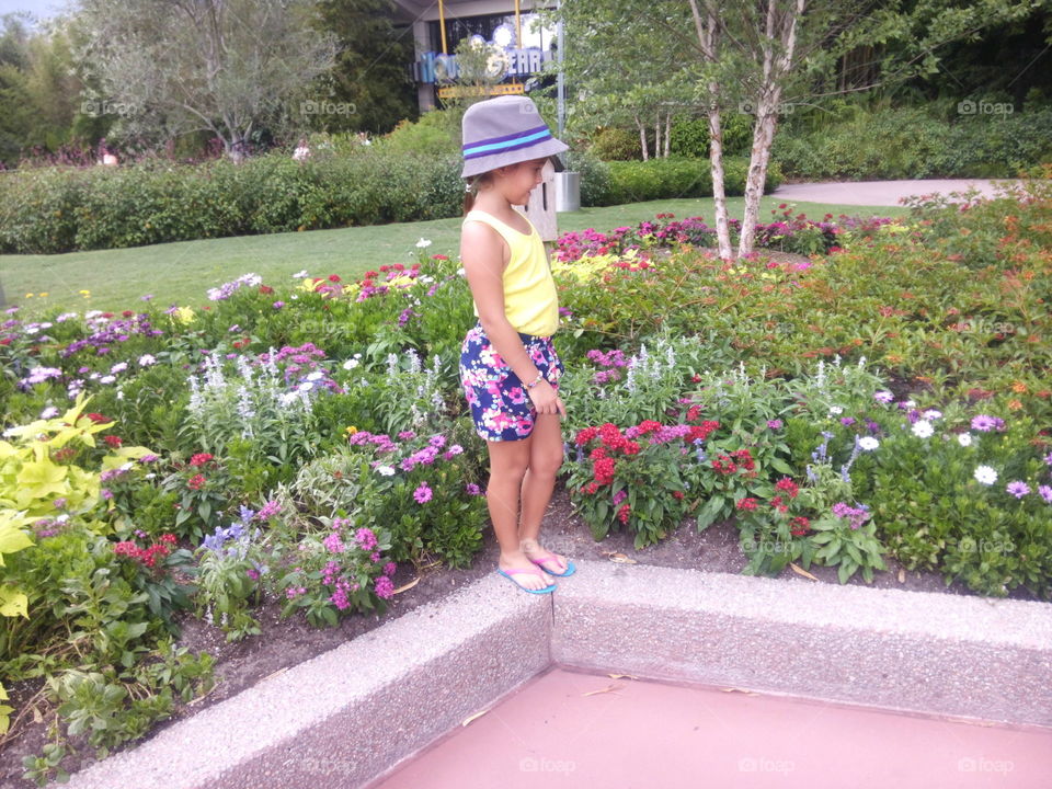 secret garden. my niece i decided to take this pic. her clothes match with the garden