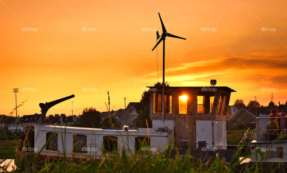 Old wooden boat at golden hour