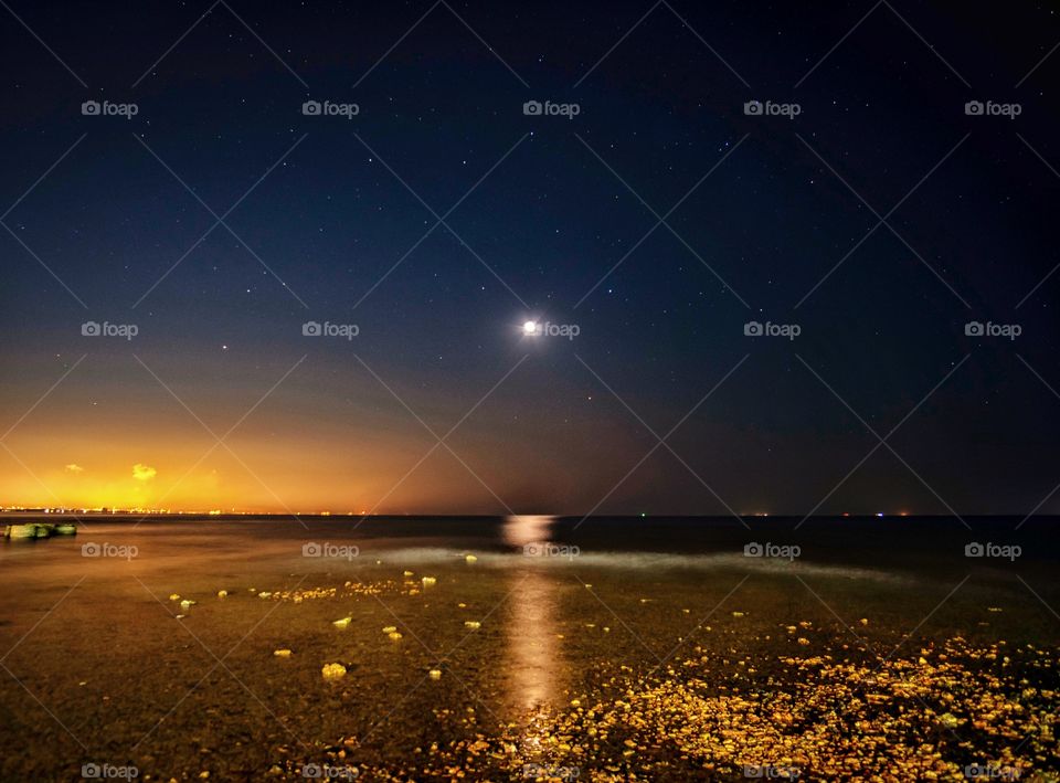 Mix and Match City light scape on Beauty moon and star background to reflect on sea