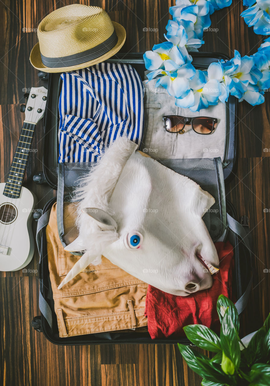 Suitcase packed for adventures!