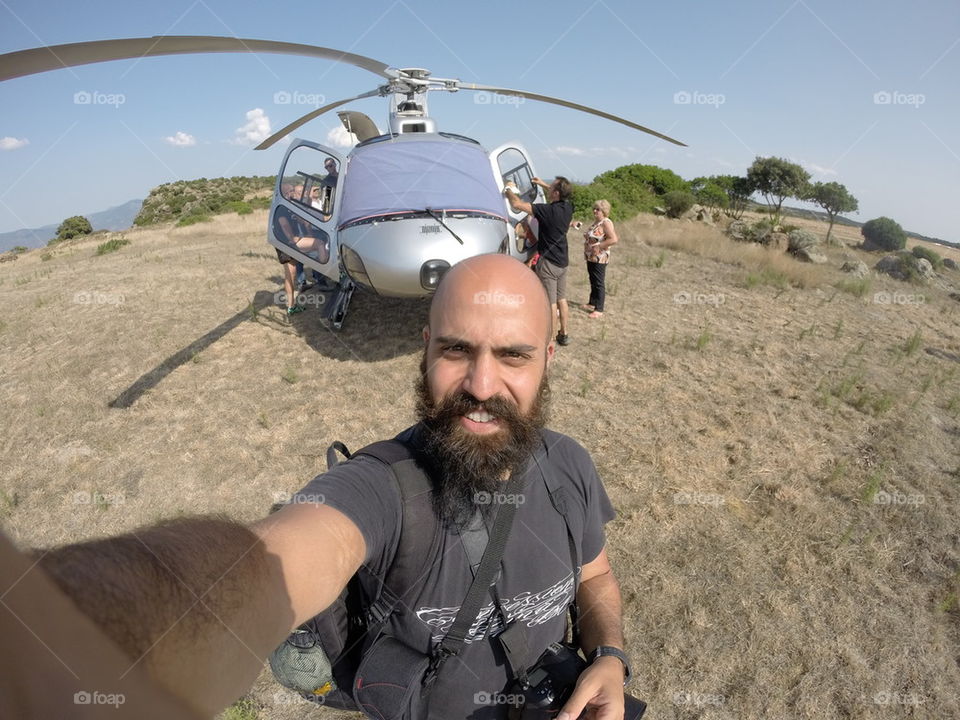 bearded man with elicopter