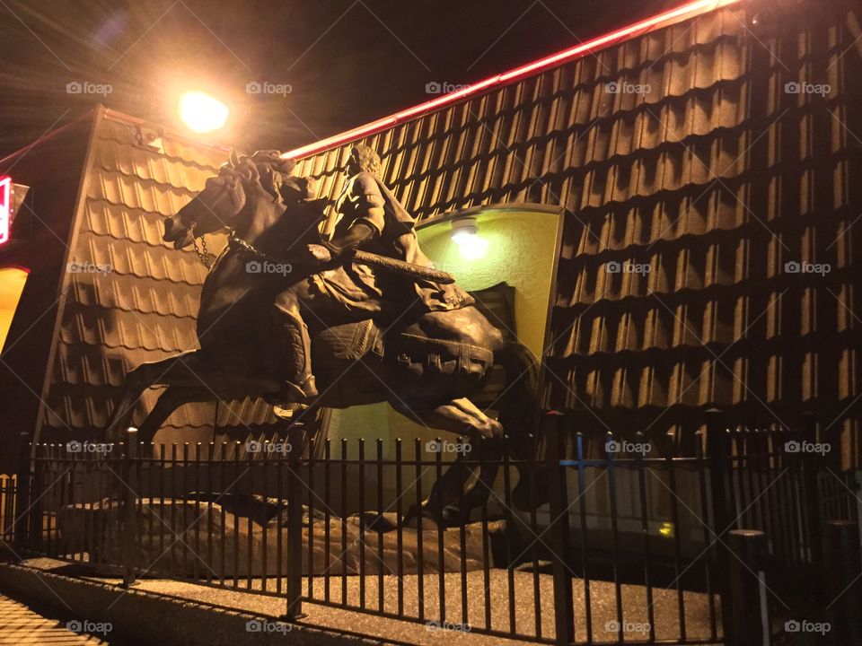 Statue in front of the Neighborhood Pub