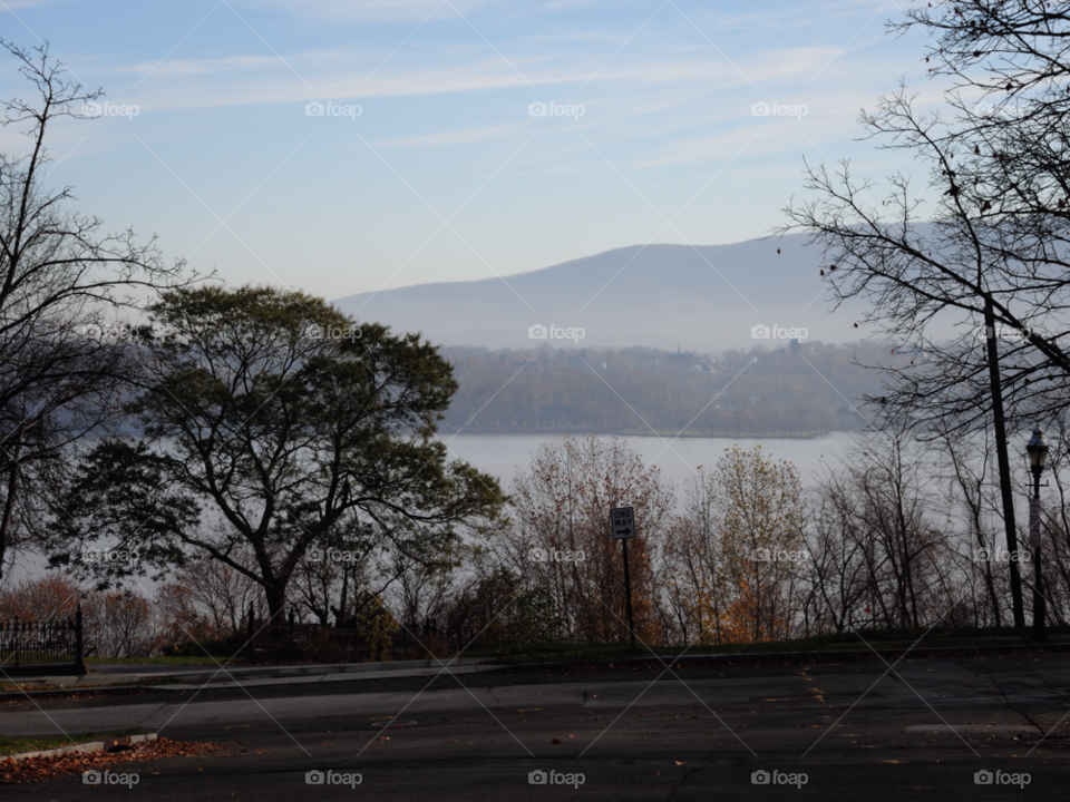 clouds trees river mountains by delvec