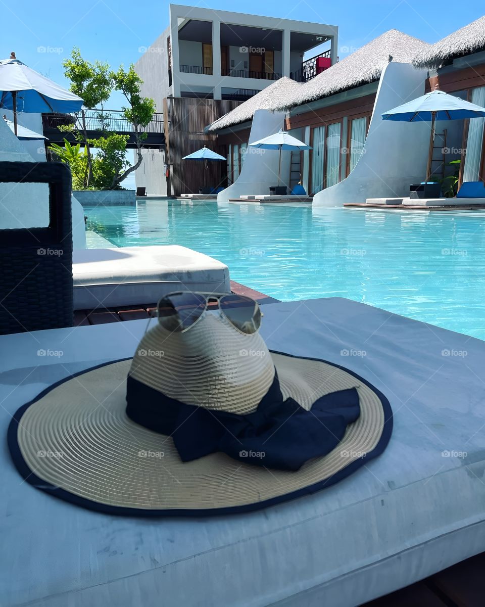 blue hat side of swimming pool