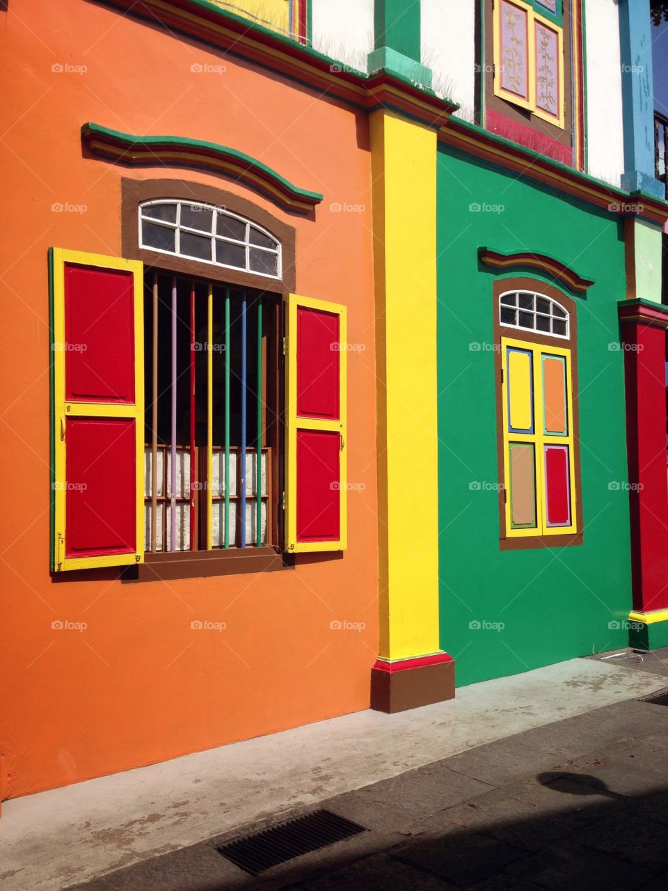 colorful windows . brightly painted windows and walls in Little India, Singapore