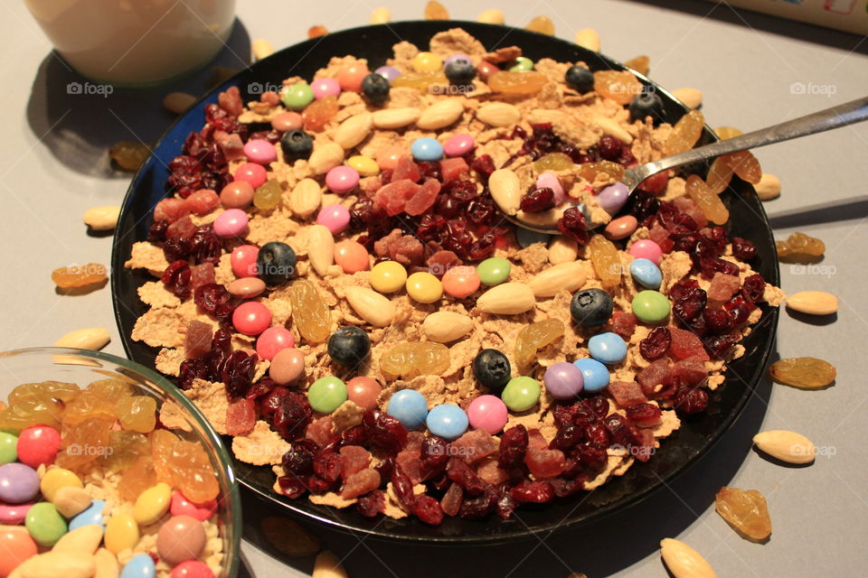 Over a delicious plates Made of flakes,almonds,dry fruits and candy