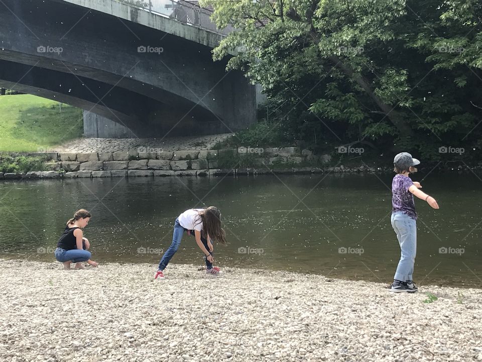 Childrens play on the river