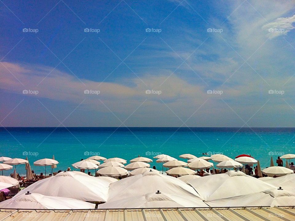 Umbrellas on the beach in Nice, France