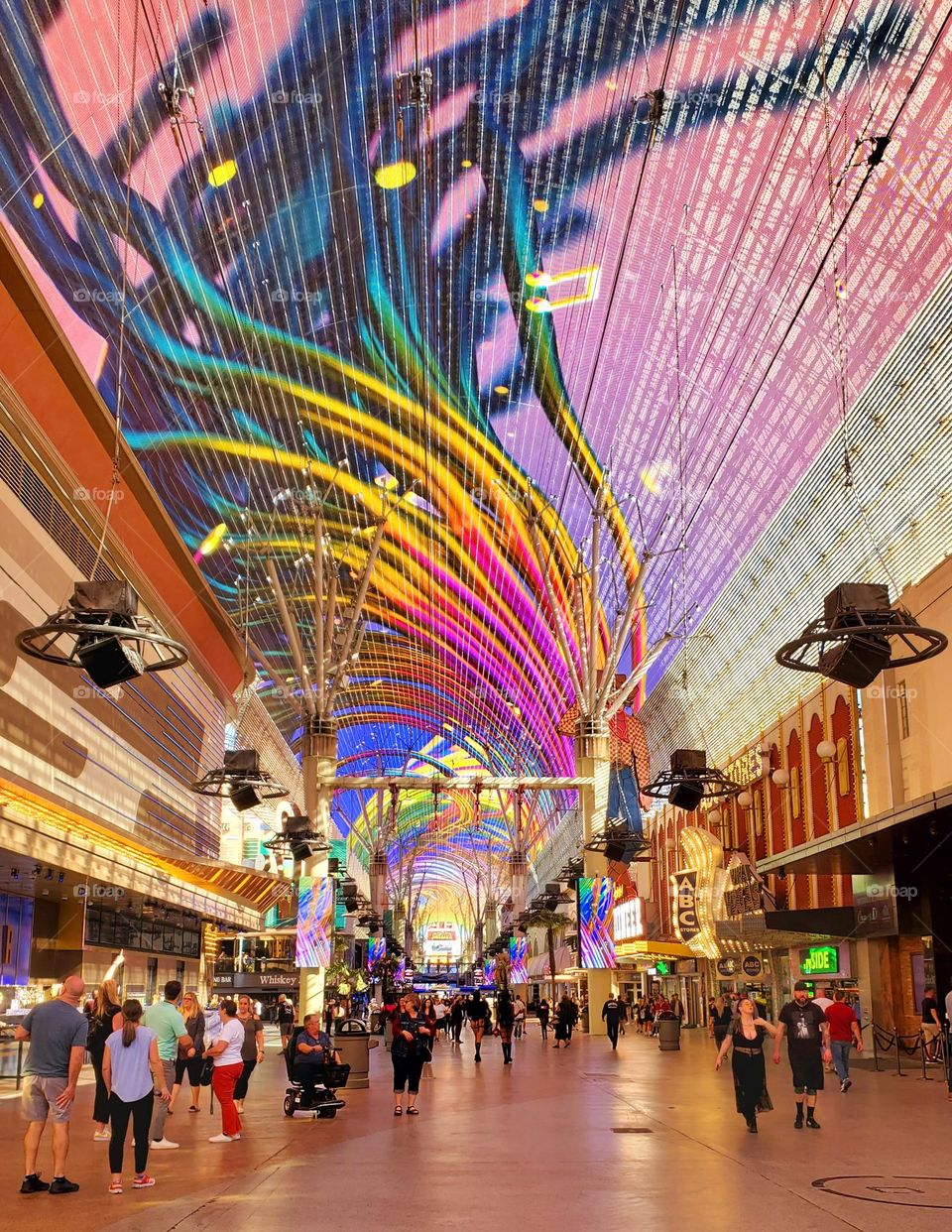 The dazzling Fremont Street experience is a fascinating attraction with colorful people and lights