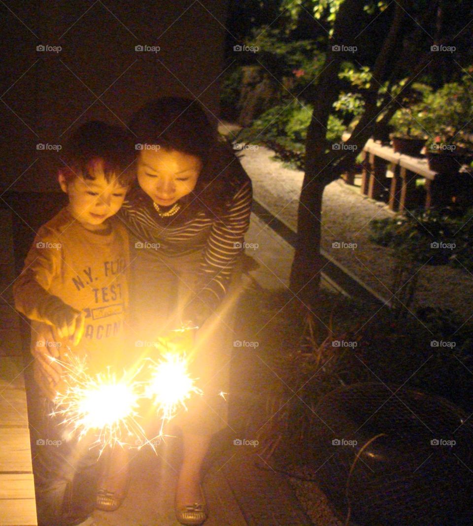 Fireworks, Asian mother and son 