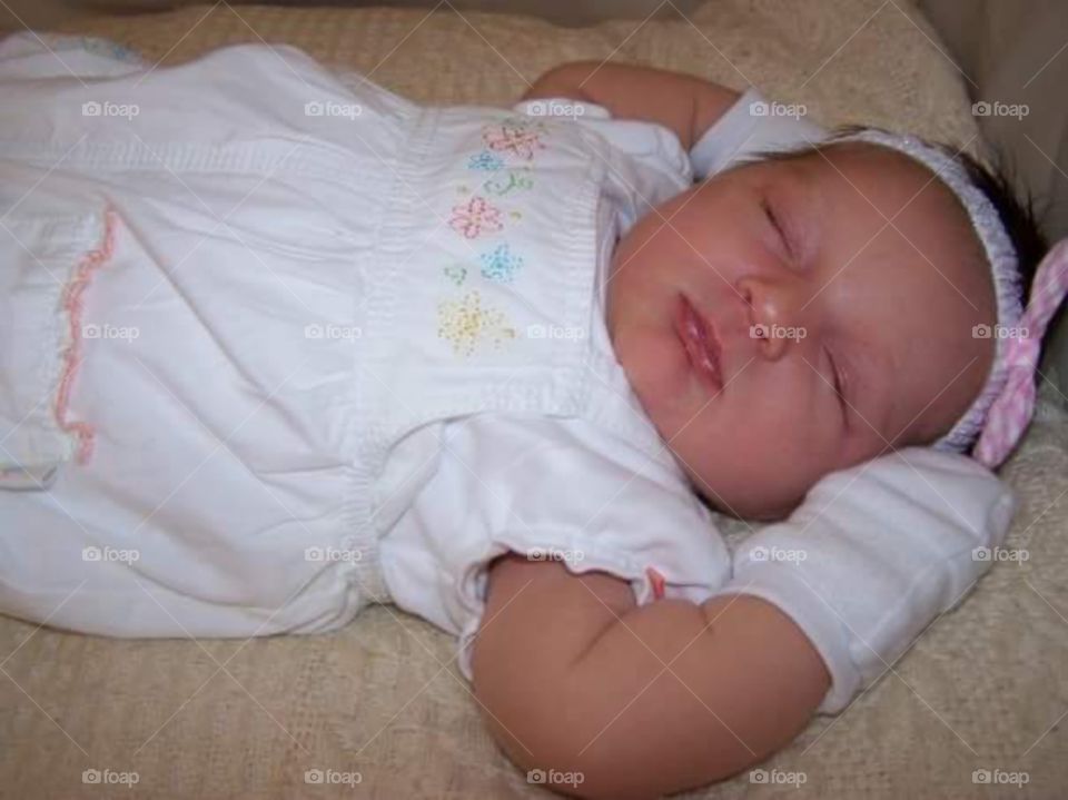 sleeping newborn baby girl