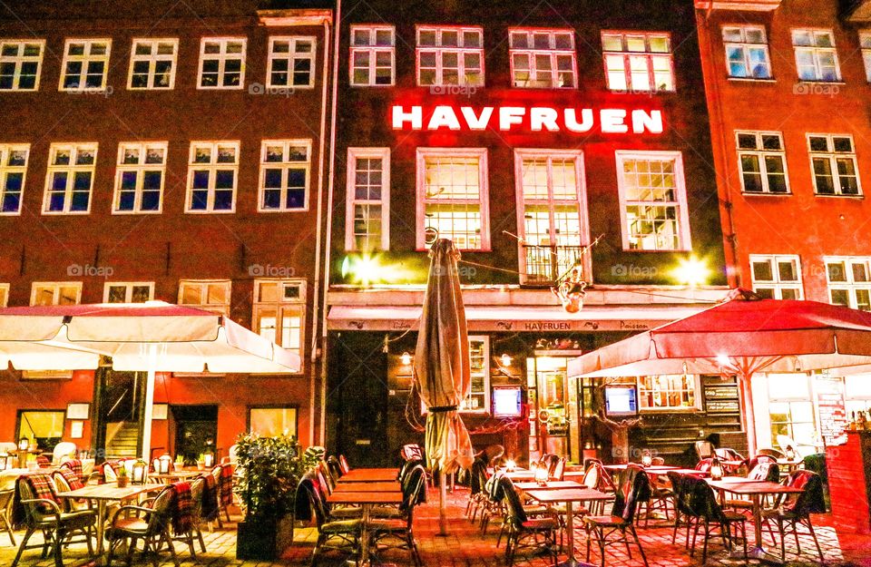 Restaurants in Nyhavn Copenhagen Denmark. Exteriors of buildings in Copenhagen Denmark 