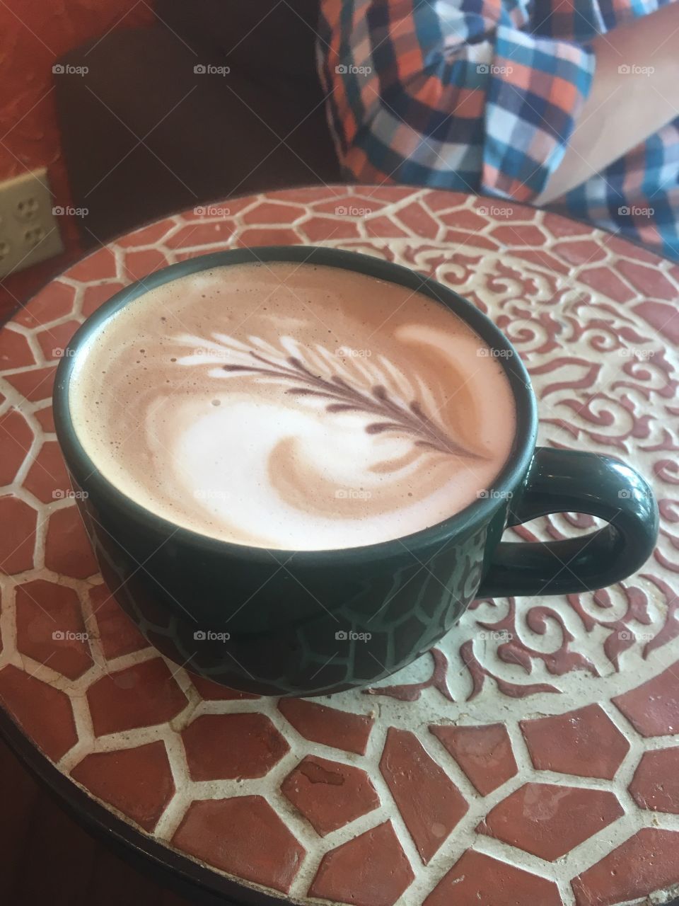 Beautiful handcrafted mocha latte from a small town coffee shop.